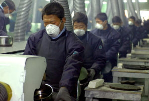 migrant workers working in a Korean factory